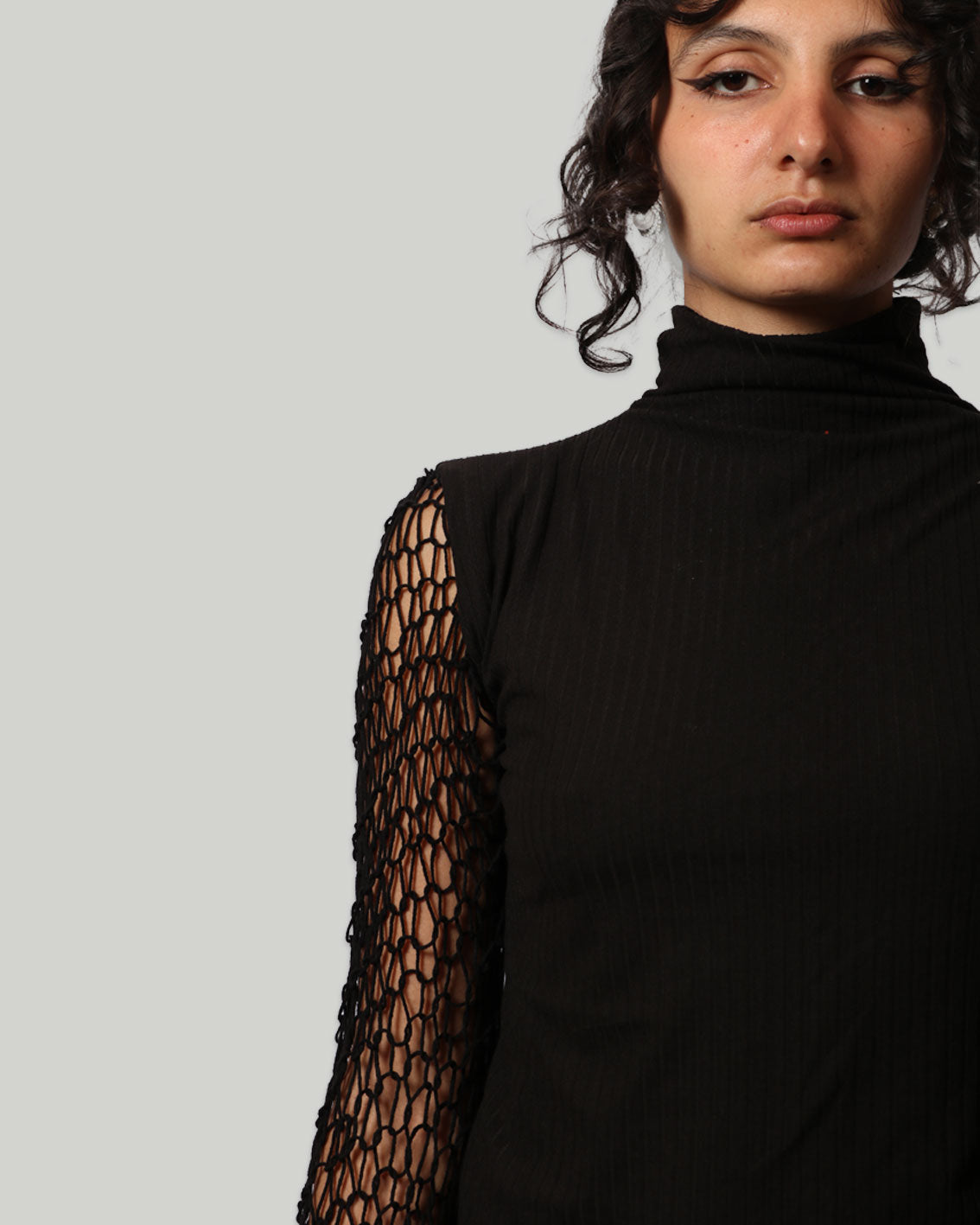 Turtleneck with Knitted Sleeves